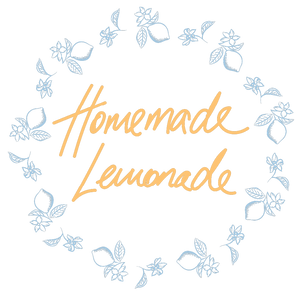 Decorative text 'Homemade Lemonade' with floral elements on a white background